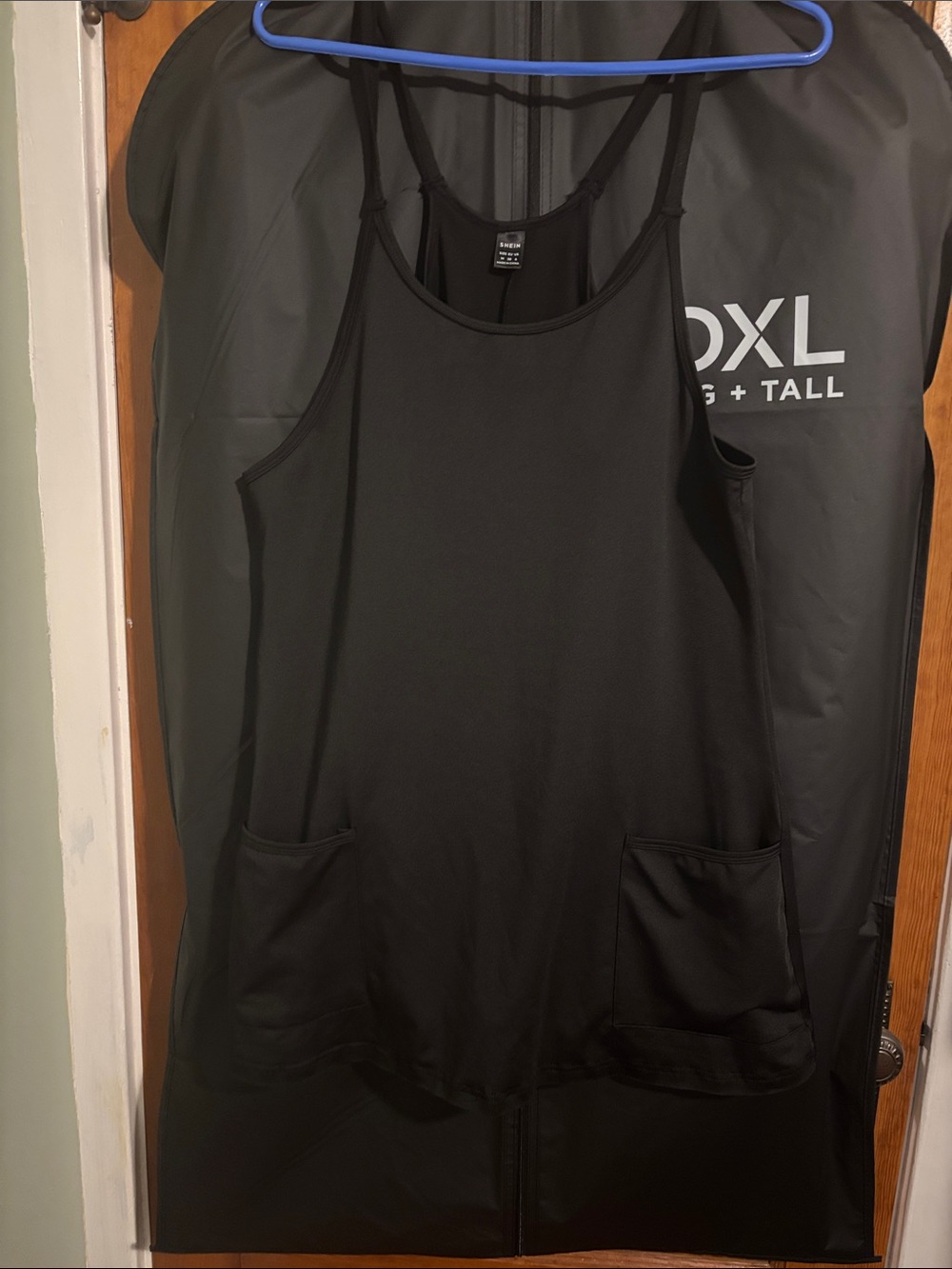 SHEIN Black Sleeveless Scoop Neck Dress with Shorts Underneath.
